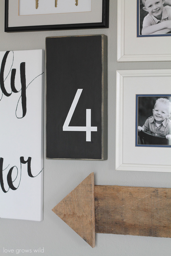 Learn how to create a fun, personal, and creative Gallery Wall for LESS THAN $20! Yes, you CAN decorate an entire wall for that cheap! Get all the best tips and tricks from LoveGrowsWild.com