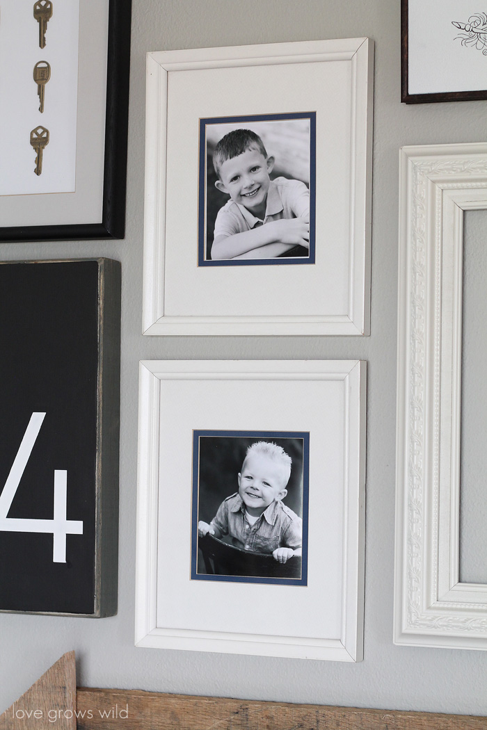 Learn how to create a fun, personal, and creative Gallery Wall for LESS THAN $20! Yes, you CAN decorate an entire wall for that cheap! Get all the best tips and tricks from LoveGrowsWild.com