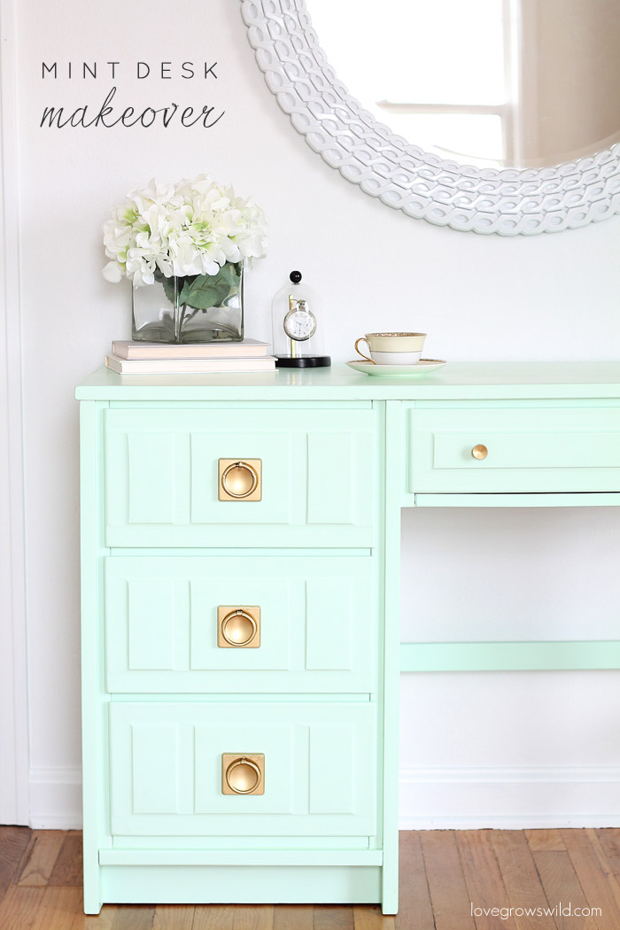 Come see how this old wood desk got a fun mint-colored makeover! Click for details at LoveGrowsWild.com