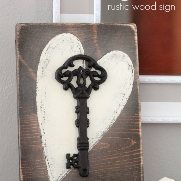 Add a touch of romance to your home with this Key to my Heart Rustic Wood Sign! Find the tutorial at LoveGrowsWild.com