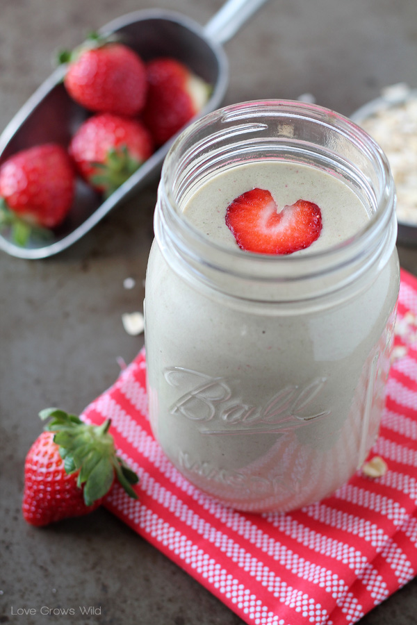 Strawberry Banana Oatmeal Smoothie - This super healthy smoothie will fill you up and keep you going all day long! So sweet and satisfying, you'll never know there's a big handful of vitamin-rich spinach hidden inside!