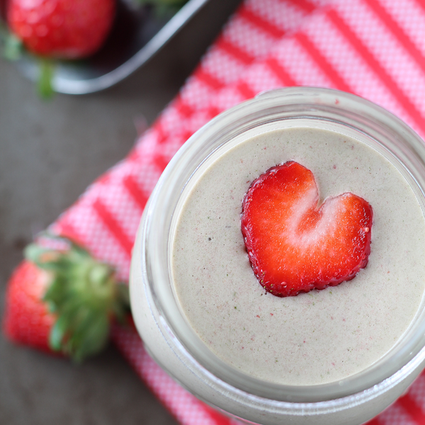 Strawberry Banana Oatmeal Smoothie - This super healthy smoothie will fill you up and keep you going all day long! So sweet and satisfying, you'll never know there's a big handful of vitamin-rich spinach hidden inside!