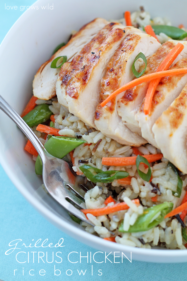 Grilled Citrus Chicken Rice Bowl - Tender grilled chicken, fresh, crisp vegetables, and a tangy citrus dressing come together in a delicious rice bowl! 