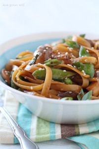 Have dinner on the table in LESS THAN 20 minutes! These Asian Noodles with Snow Peas and Mushrooms combine fresh, healthy ingredients and a flavorful homemade sauce in less time than it takes to boil the noodles! You MUST try this delicious Asian-inspired dish! LoveGrowsWild.com