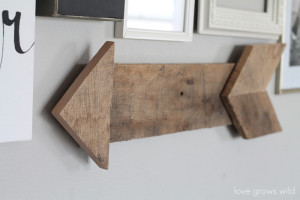 Learn how to create this simple, rustic wood pallet arrow! | LoveGrowsWild.com