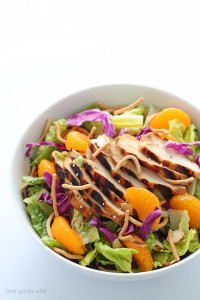 A fresh, flavorful Asian Chicken Salad with tender grilled chicken slices, juicy mandarin oranges, and a delicious sesame dressing! | LoveGrowsWild.com