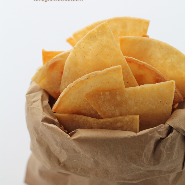 Easy, homemade Baked Tortilla Chips! Perfect for dips, salsa, and guacamole! | LoveGrowsWild.com