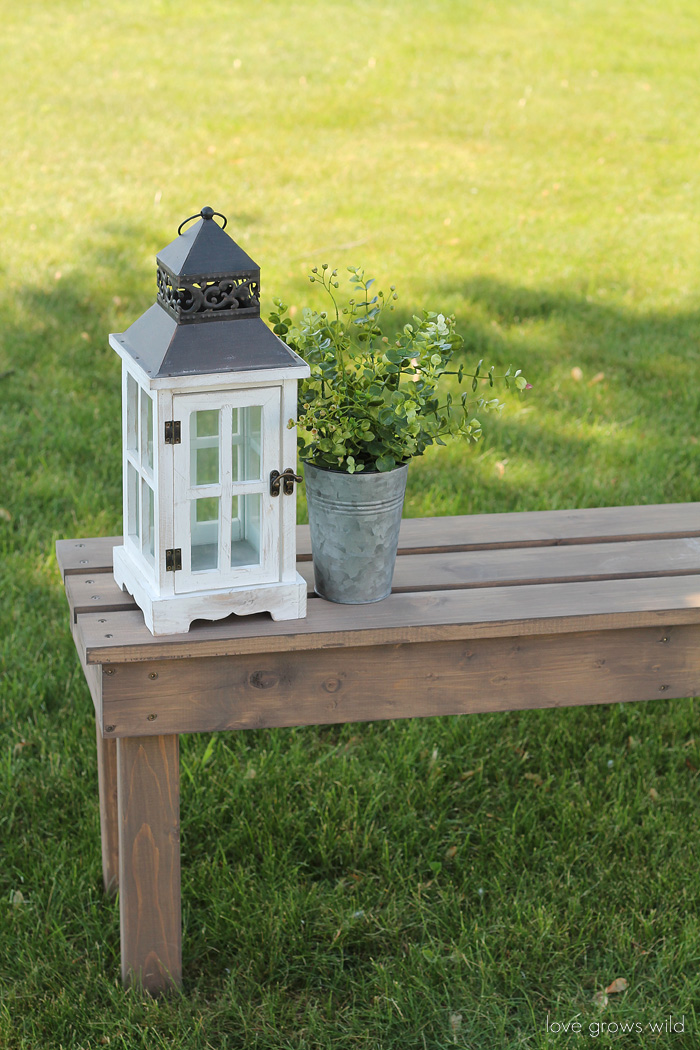 Add extra seating with this beautiful and easy DIY Outdoor Bench! | Tutorial at LoveGrowsWild.com