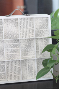 A simple printer's tray lined with old book pages makes a beautiful piece of decor! | LoveGrowsWild.com