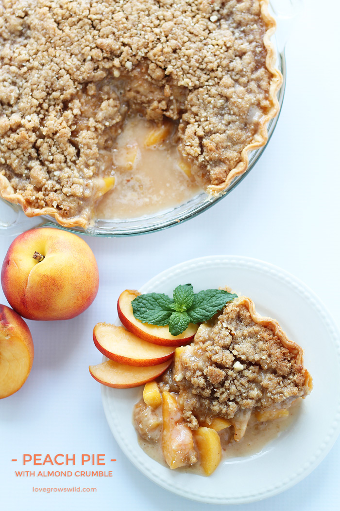 Enjoy the best flavors of summer with this perfect Peach Pie recipe topped with a delicious almond crumble! | LoveGrowsWild.com