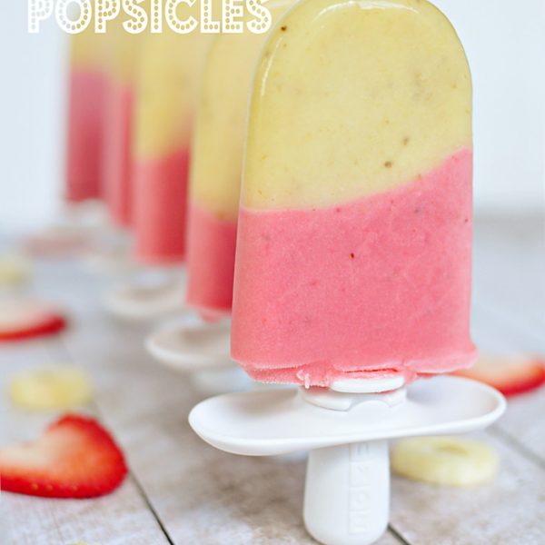 Cold and creamy Strawberry Banana Popsicles are the perfect summertime treat! | LoveGrowsWild.com