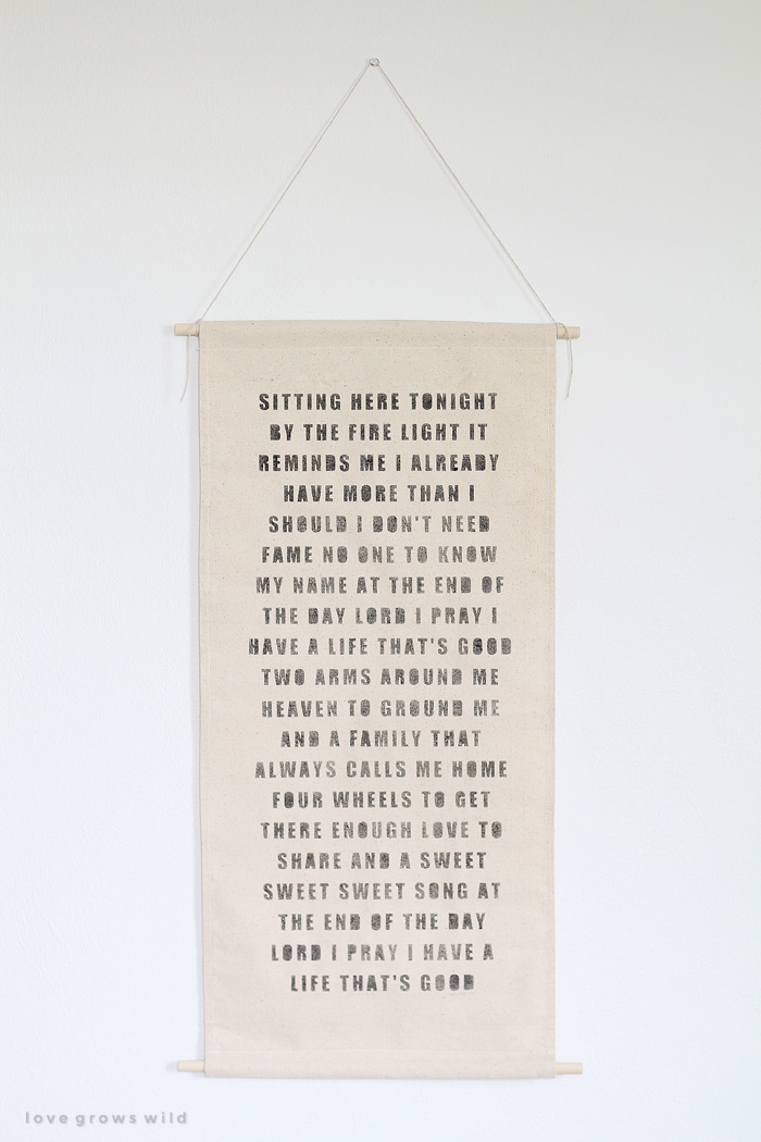 Hang a canvas scroll with your favorite quotes or song lyrics for instant wall art! Details at LoveGrowsWild.com