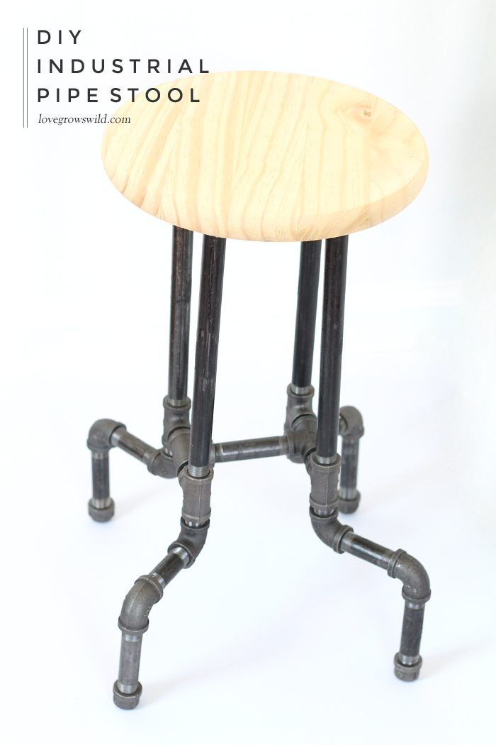 Learn how to make these awesome DIY Industrial Pipe Stools for your kitchen or office with no tools required! Click for details at LoveGrowsWild.com