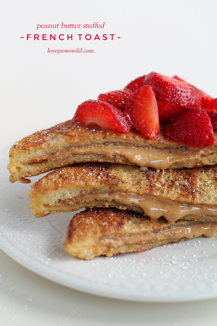 A decadent french toast recipe stuffed with creamy peanut butter and topped with fresh strawberries! This is one amazing breakfast! | LoveGrowsWild.com