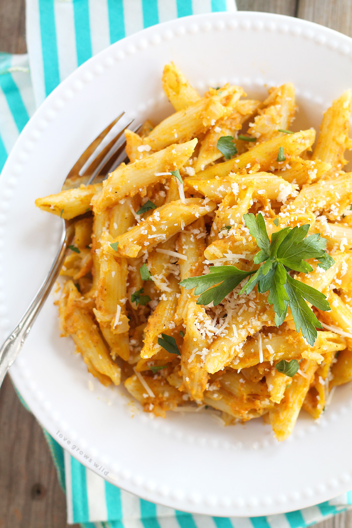 Pumpkin isn't just for dessert anymore! This Cheesy Pumpkin Pasta Bake is super creamy and SO delicious! | LoveGrowsWild.com