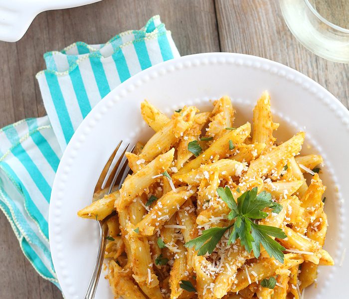 Pumpkin isn't just for dessert anymore! This Cheesy Pumpkin Pasta Bake is super creamy and SO delicious! | LoveGrowsWild.com