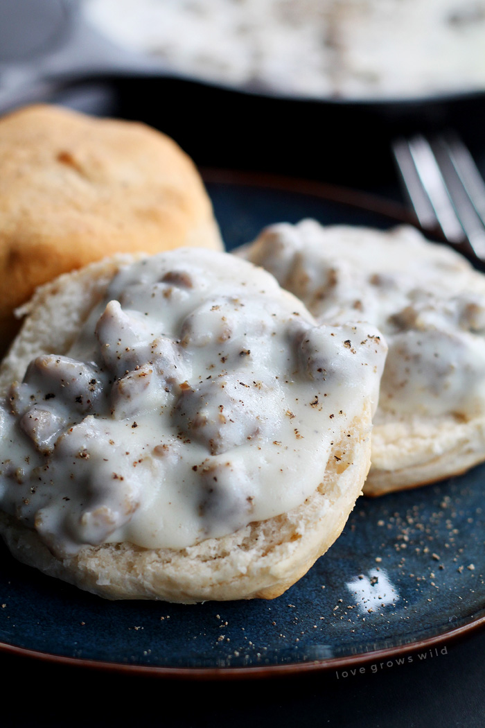 This super simple Biscuits and Gravy recipe is pure breakfast comfort food! Get the recipe at LoveGrowsWild.com