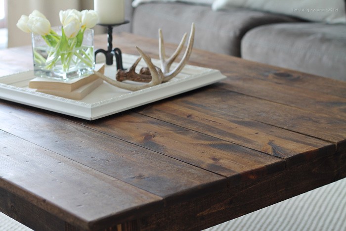 Learn how to build this rustic wood farmhouse coffee table at LoveGrowsWild.com! Click for more photos, supply list, and tutorial!