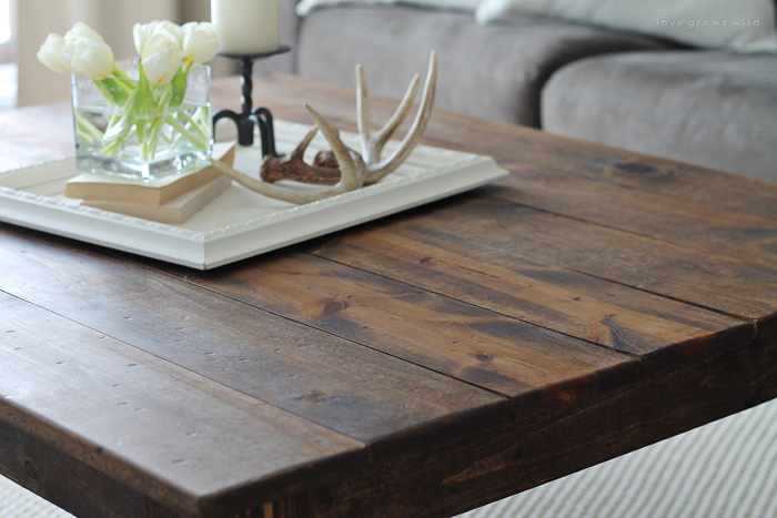Learn how to build this rustic wood farmhouse coffee table at LoveGrowsWild.com! Click for more photos, supply list, and tutorial!