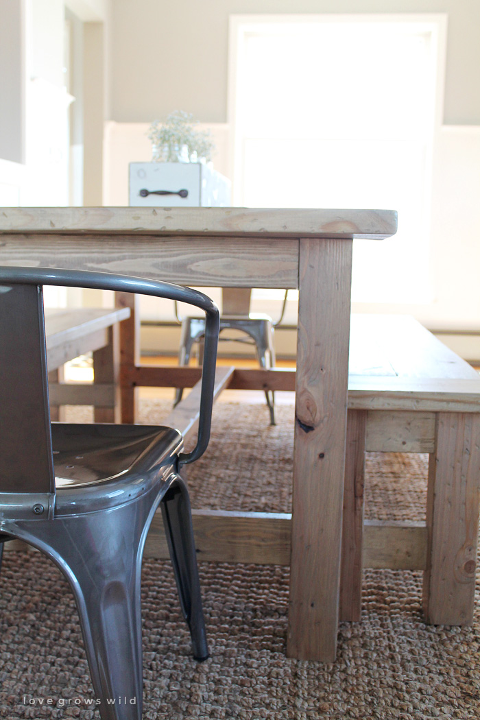 This large farmhouse table seats 8+ and adds great rustic charm to your dining room. See more photos and project details at LoveGrowsWild.com
