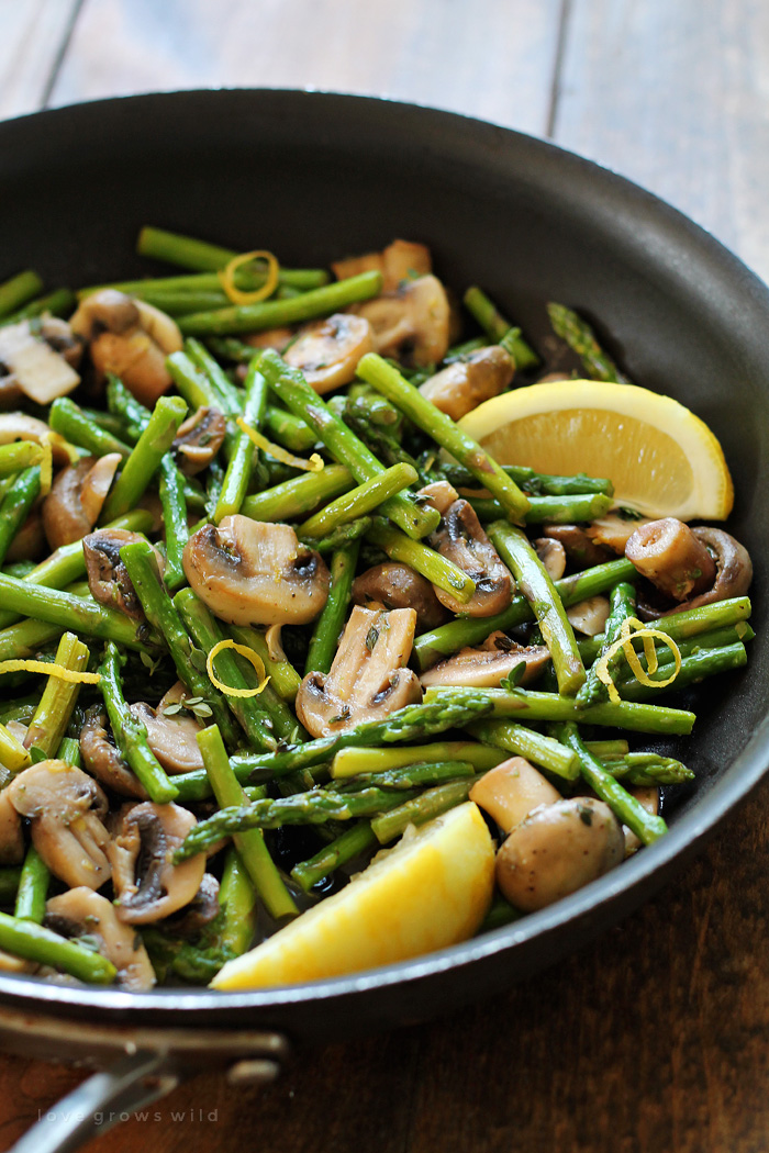 Asparagus and mushrooms lightly sautéed in butter and flavored with lemon zest and fresh thyme. A delicious and healthy side dish that pairs well with just about any meal! Get the recipe at LoveGrowsWild.com