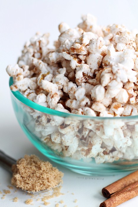 This Cinnamon Brown Sugar Popcorn is absolutely amazing! The perfect sweet snack that won't blow your diet. Get the recipe at LoveGrowsWild.com
