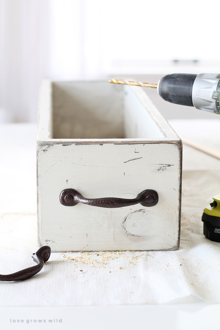 This rustic Wood Box Centerpiece is perfect for displaying flowers and other decorative items on your table. Get the easy step-by-step tutorial for making your own box at LoveGrowsWild.com