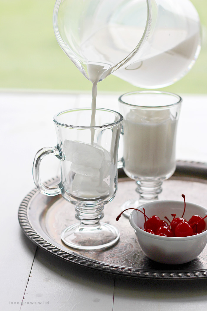 Learn how to make Italian Cream Sodas at home! This cross between creamy vanilla ice cream and fizzy soda is the perfect sip when you want a sweet treat. Get the recipe at LoveGrowsWild.com