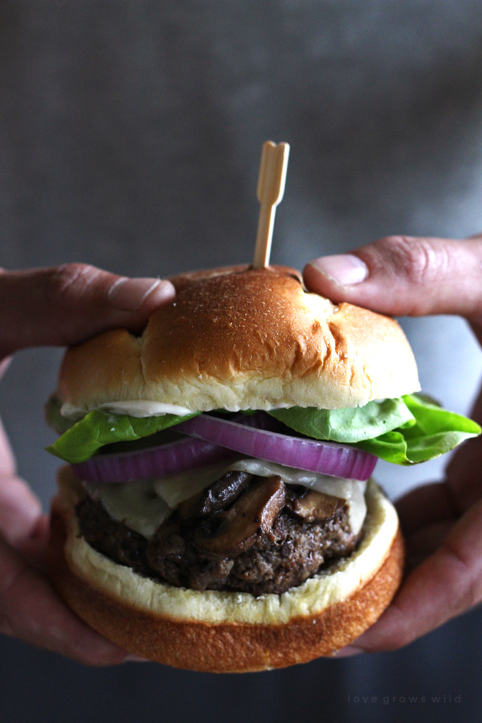 Juicy, meaty, mushroom burgers topped with swiss cheese and sautéed mushrooms - get the recipe at LoveGrowsWild.com
