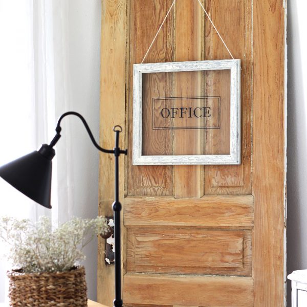 Turn any picture frame into a hanging sign! See more photos of this gorgeous farmhouse office decorated with an old door at LoveGrowsWild.com