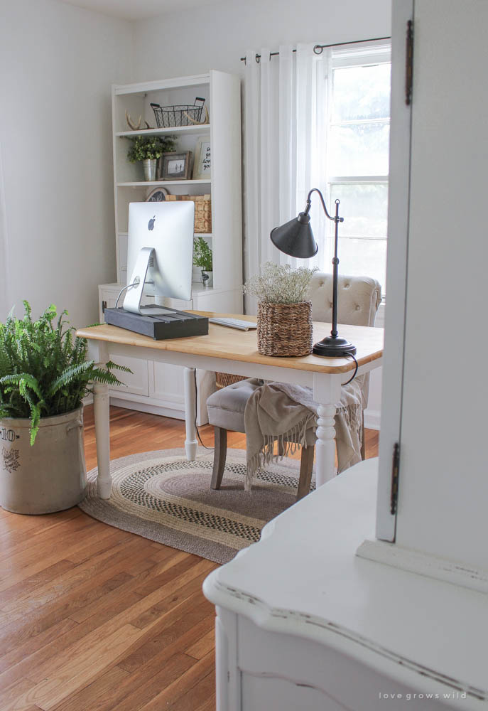 A must-see makeover! Check out the transformation of this gorgeous home office decorated with vintage finds and tons of farmhouse charm at LoveGrowsWild.com