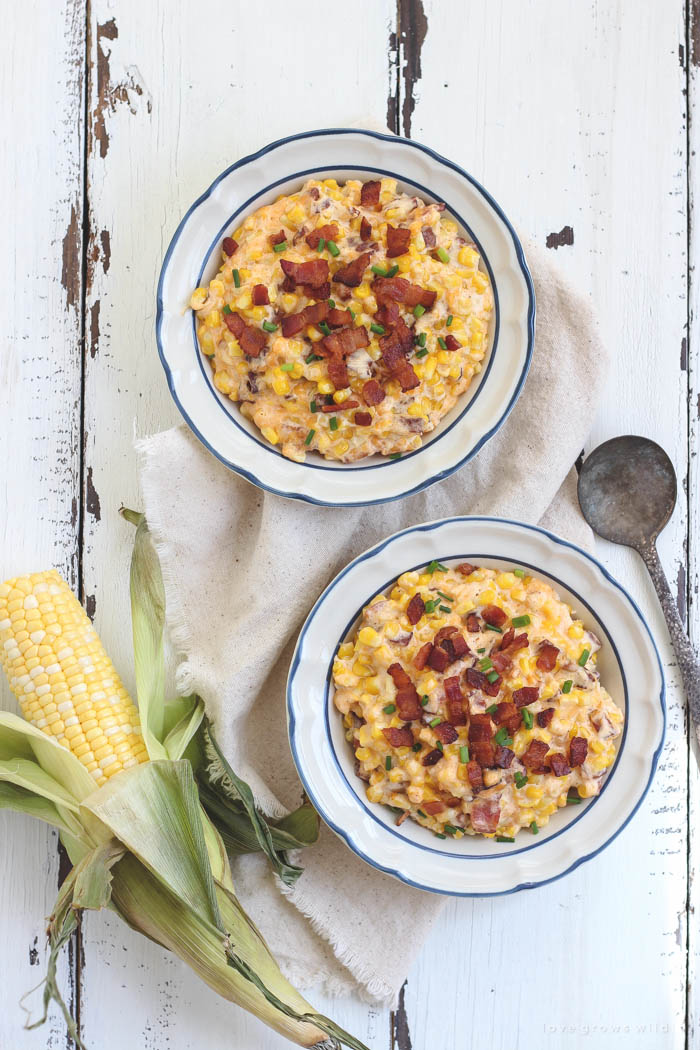 You must try this easy, mouthwatering side dish! Creamy, cheesy corn casserole hot out of the oven with tons of crispy bacon! | LoveGrowsWild.com