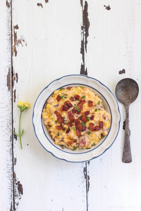 You must try this easy, mouthwatering side dish! Creamy, cheesy corn casserole hot out of the oven with tons of crispy bacon! | LoveGrowsWild.com