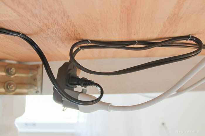 HOW TO HIDE CORDS BEHIND A DESK THAT IS AGAINST A WALL OR WINDOW