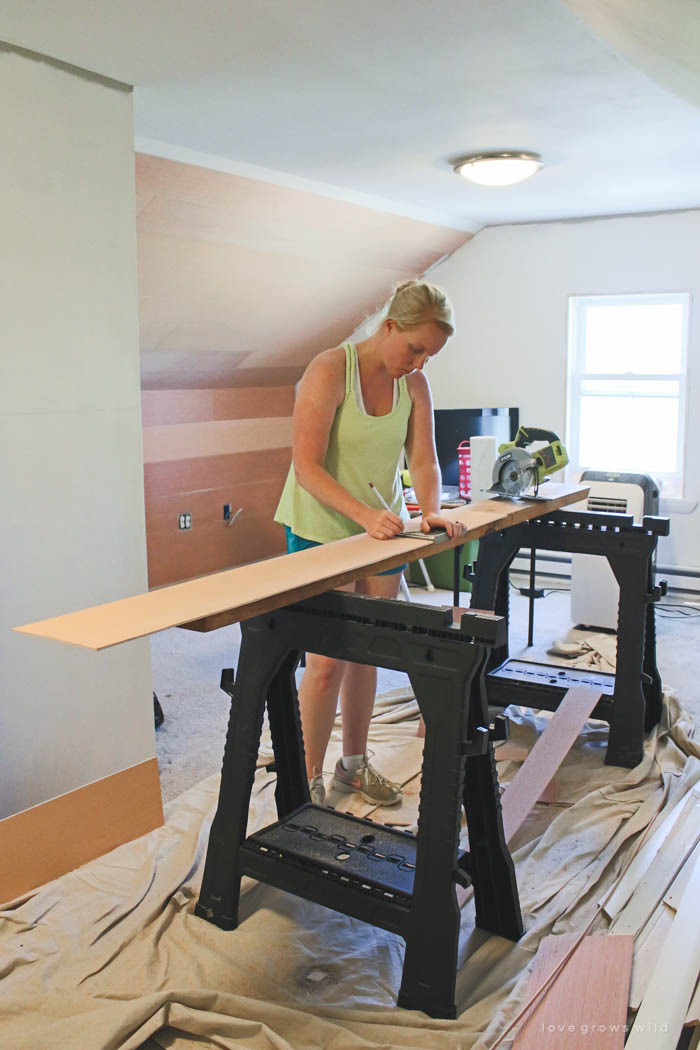 This master bedroom gets a dramatic makeover with beautiful white wide plank walls. Learn how to plank YOUR walls at LoveGrowsWild.com!