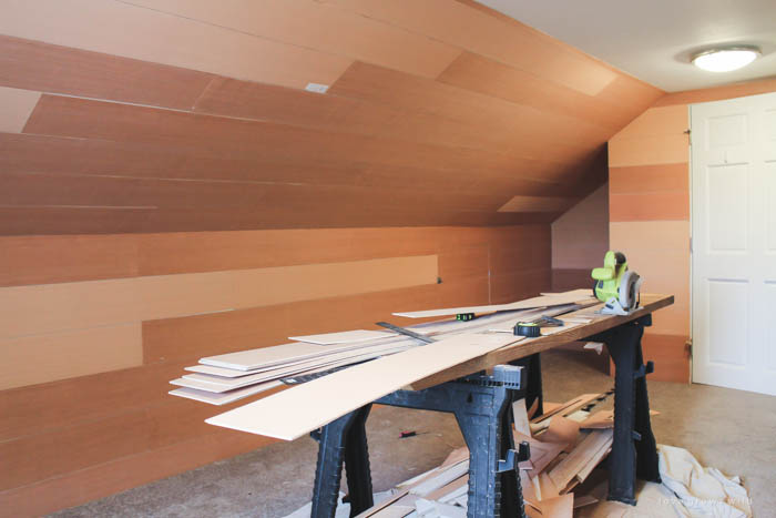 This master bedroom gets a dramatic makeover with beautiful white wide plank walls. Learn how to plank YOUR walls at LoveGrowsWild.com!