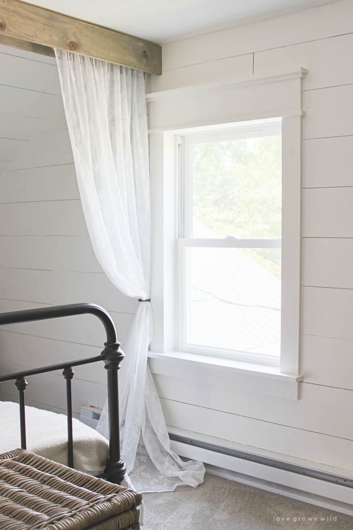 Black Window Frames With White Trim In Contemporary Bedroom