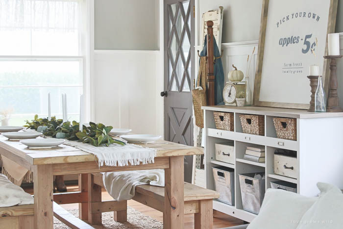 See more photos of this beautiful farmhouse dining room decorated for fall at LoveGrowsWild.com