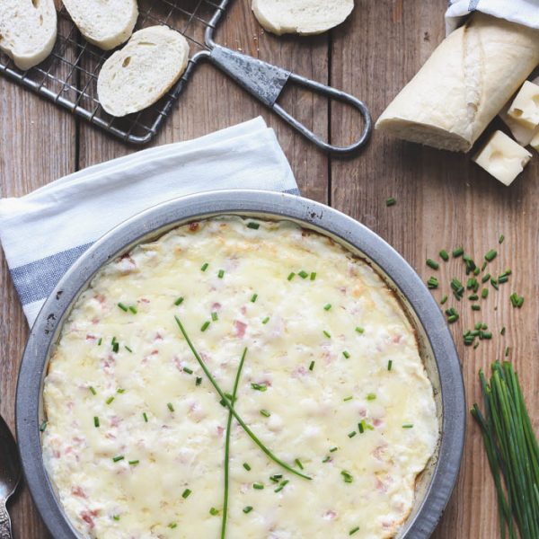 Warm, gooey Swiss cheese and little bites of ham come together this delicious dip that is sure to be the hit of your next party! Get the recipe at LoveGrowsWild.com