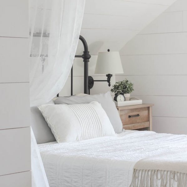 Lots of stylish, affordable furniture options in this farmhouse master bedroom! Click for more photos and details at LoveGrowsWild.com