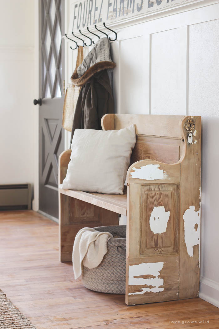 See how an old wood door transforms into a gorgeous, rustic bench! Get the full tutorial on LoveGrowsWild.com
