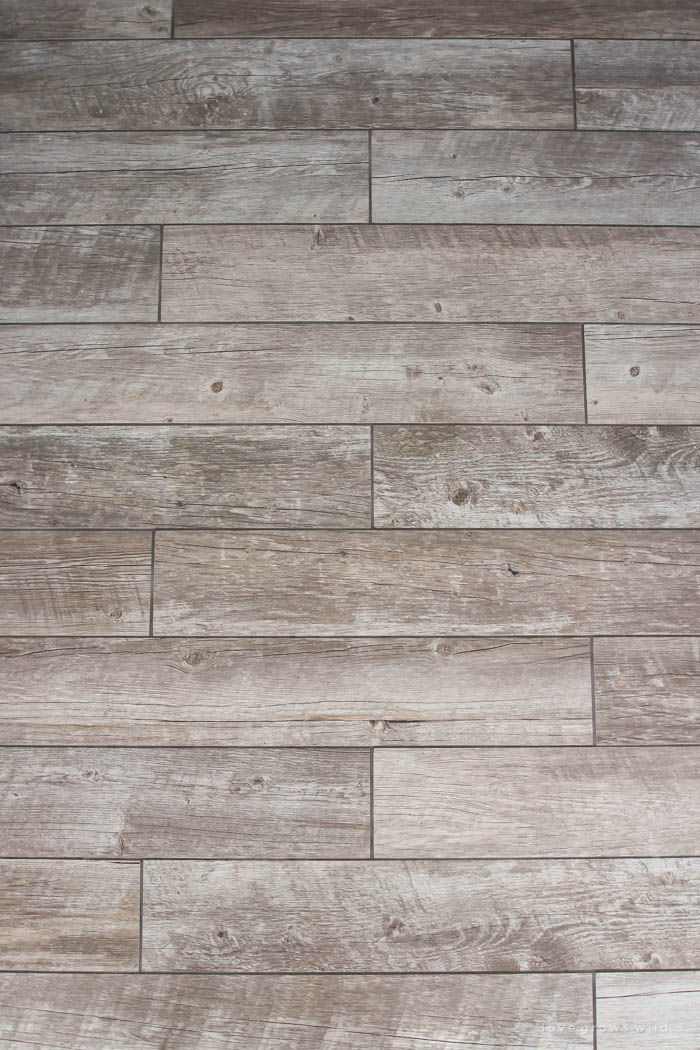 Follow along the makeover of this beautiful farmhouse kitchen! In this post, Liz shares her tile choice for flooring. Click for more photos and details!