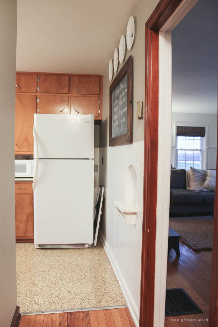 See our plans for turning this dated, dysfunctional space into a gorgeous, modern farmhouse kitchen! More photos and details at LoveGrowsWild.com