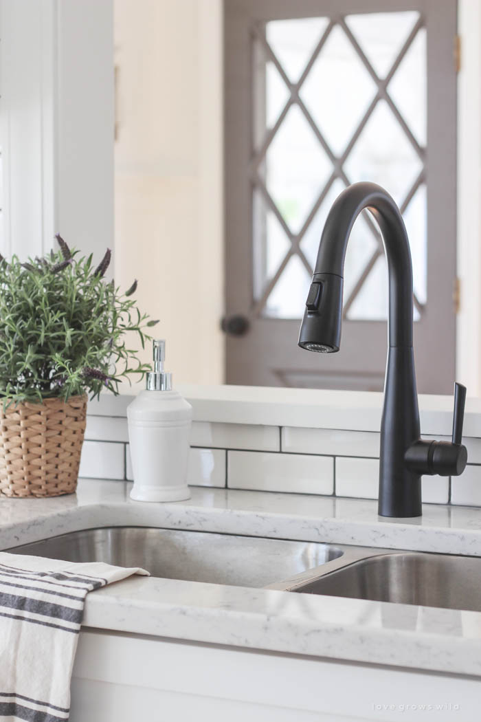 Follow along the makeover of this beautiful farmhouse kitchen! In this post, Liz shares the backsplash she chose and why. Click for more photos and details!