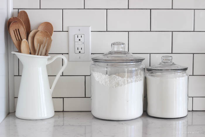 This Indiana farmhouse just got a BIG kitchen makeover! Click to see more photos and sources for this gorgeous space at LoveGrowsWild.com