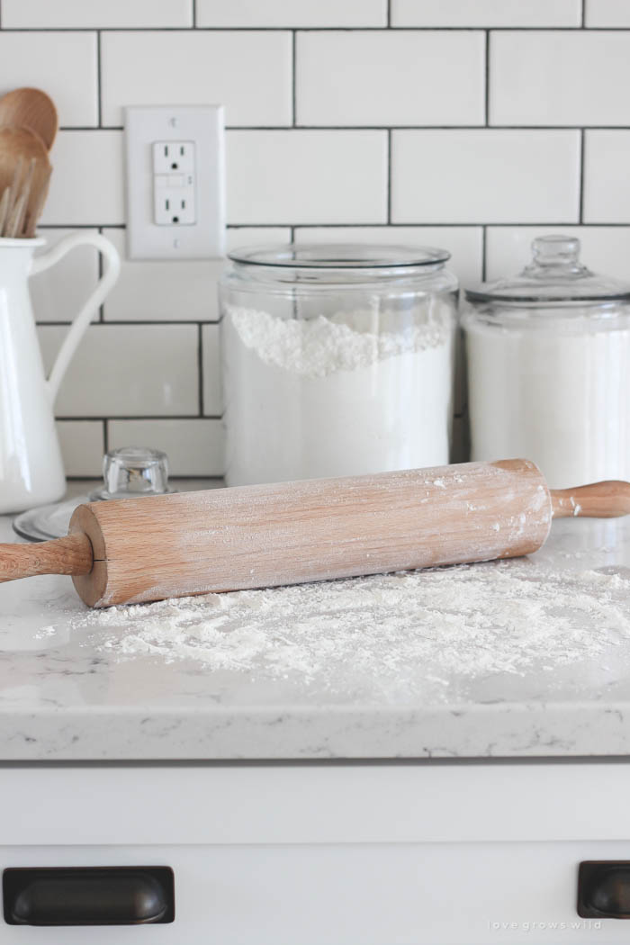 Follow along the makeover of this beautiful farmhouse kitchen! In this post, Liz shares the countertops she picked and why. Click for more photos and details!