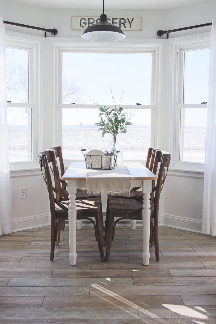 This Indiana farmhouse just got a BIG kitchen makeover! Click to see more photos and sources for this gorgeous space at LoveGrowsWild.com