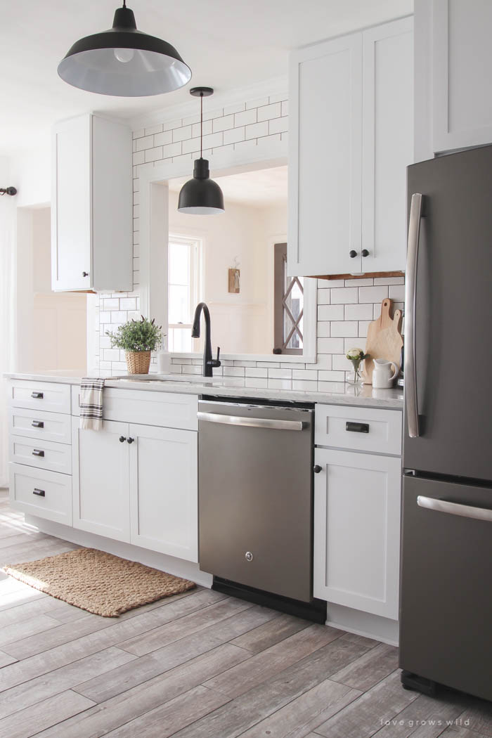 Follow along the makeover of this beautiful farmhouse kitchen! In this post, Liz shares the backsplash she chose and why. Click for more photos and details!