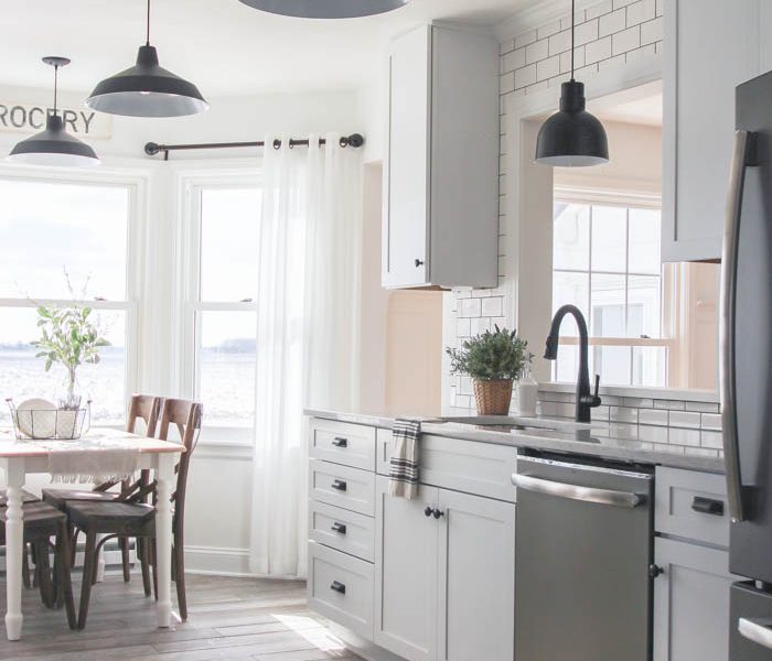 This Indiana farmhouse just got a BIG kitchen makeover! Click to see more photos and sources for this gorgeous space at LoveGrowsWild.com