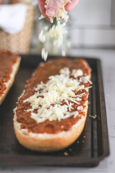 This Toasted Chili Cheese Bread is the perfect quick appetizer and SO delicious! Tons of gooey cheese with a spicy kick of chili! Recipe at LoveGrowsWild.com